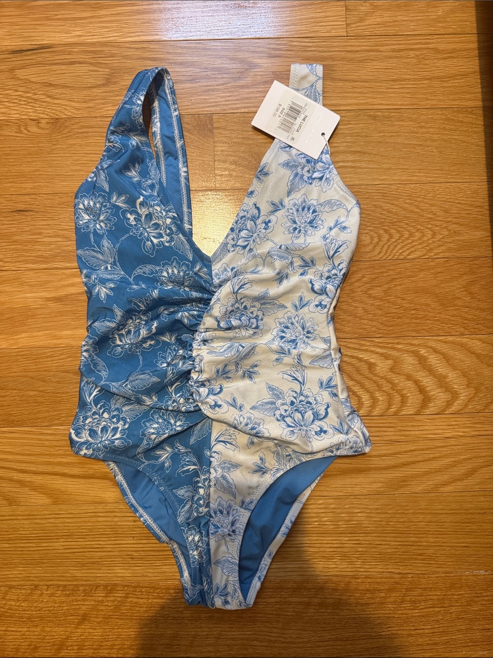 NWT solid and striped swimsuit